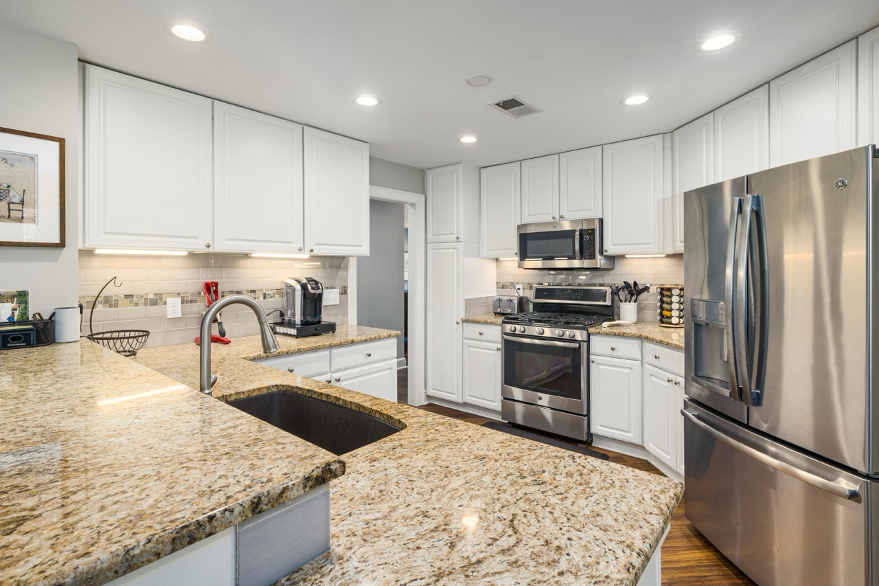 White kitchen with modern fixtures